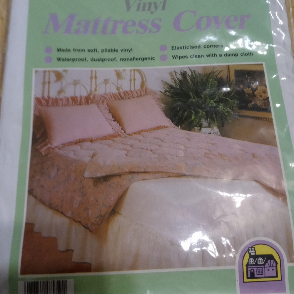 New in package twin fitted vinyl mattress cover